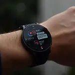 Smartwatch displaying health metrics and notifications