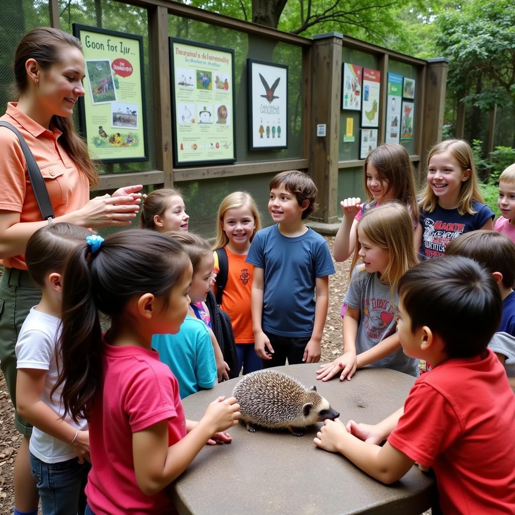 Zoo educational program with children learning about animals