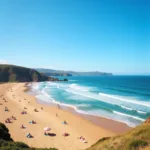 People enjoying weekend at Crystal Beach with calm waves and golden sand